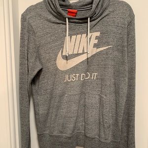 Nike long sleeve shirt with front pocket and hood